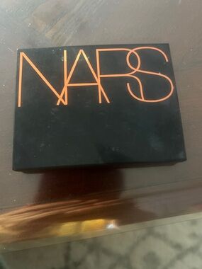 NARS Black Compact with Orange Logo